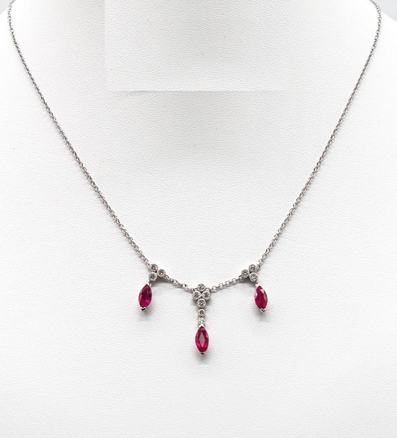 Бриллиантовая подвеска с рубинами